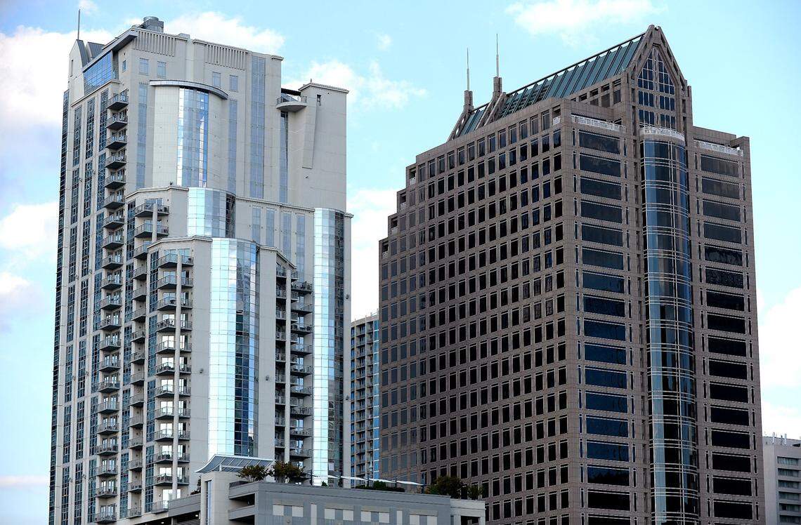 The Carillon Tower, right, will have two permanent bee hives installed in a courtyard adjacent to the 24-story office building. It’s a step toward helping a dwindling honey bee population.
