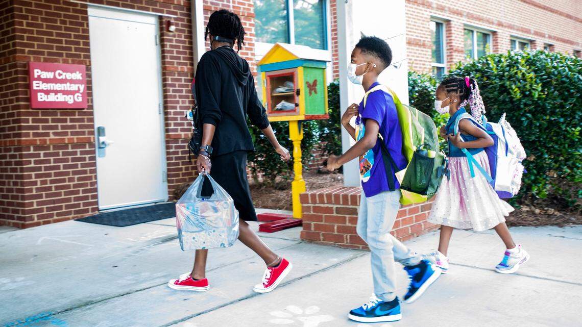 Cooper signs law that says school boards must vote each month if they require face masks