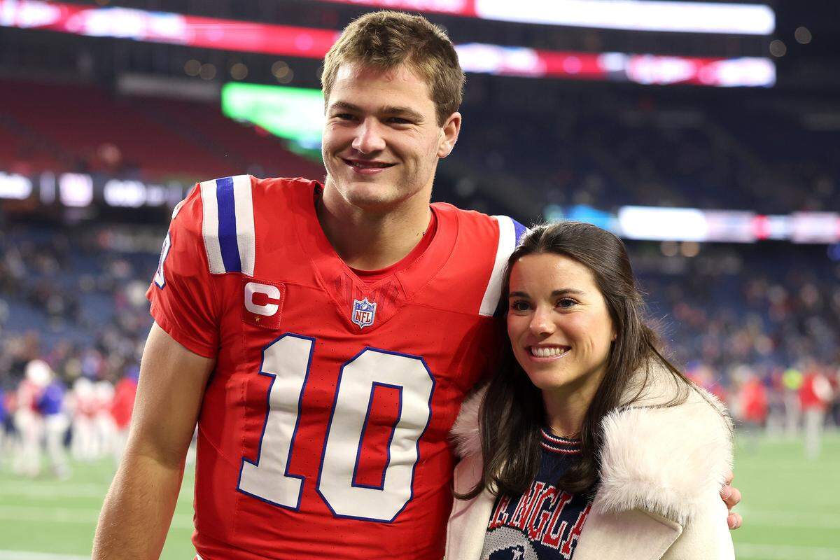 FOXBOROUGH, MASSACHUSETTS - DECEMBER 01: Drake Maye #10 of the New England Patriots and his wife Ann Michael Maye pose for a photo prior to the game against the New York Giants at Gillette Stadium on December 01, 2025 in Foxborough, Massachusetts. (Photo by Maddie Meyer/Getty Images)