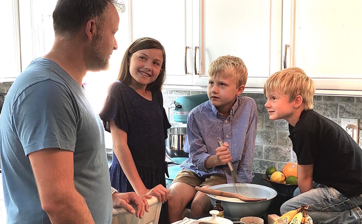 A family photo shoot, making banana bread, breaks most of the family out of their PJs.