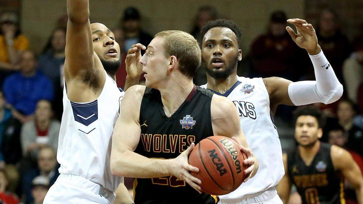 Daniel Carr, right, and his Queens University teammates will host the Southeast Regional of the men’s Division 2 basketball tournament this weekend. (Photo by Dave Eggen/Inertia)