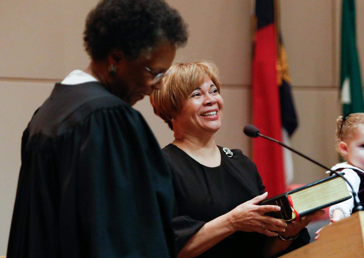 Newly elected mayor Vi Lyles shares why the Bible she will swear on is special by saying it had her mothers handwriting in it during the Swearing-In Ceremony in Charlotte on Monday, December 4, 2017.