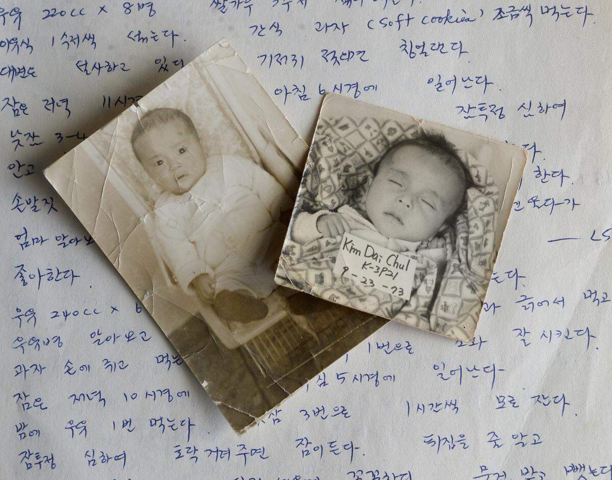 Among the items in Theoden Janes adoption papers are two photographs that have been stored in a tub in the attic of his home. Janes was born in South Korea and was adopted by a couple in Connecticut.