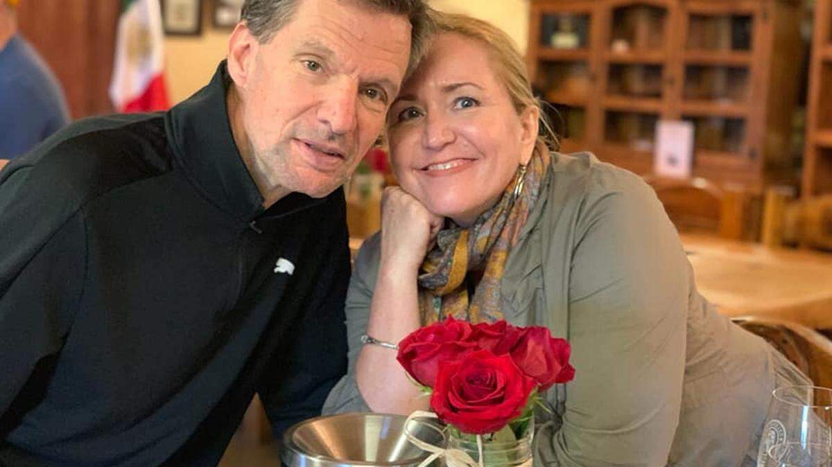 George Walker photographed with his wife, Elizabeth,  around 2021. The beloved high school teacher and accomplished runner, who died this week at 64, showed extraordinary grace and dedication till the end.