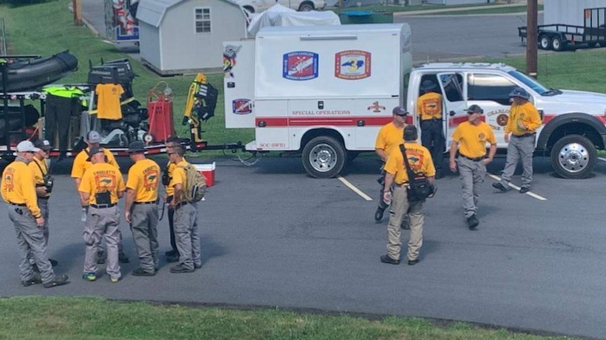 Charlotte firefighters are in Haywood County NC helping officials search for the remaining seven people still missing after Tropical Storm Fred flooded western North Carolina.