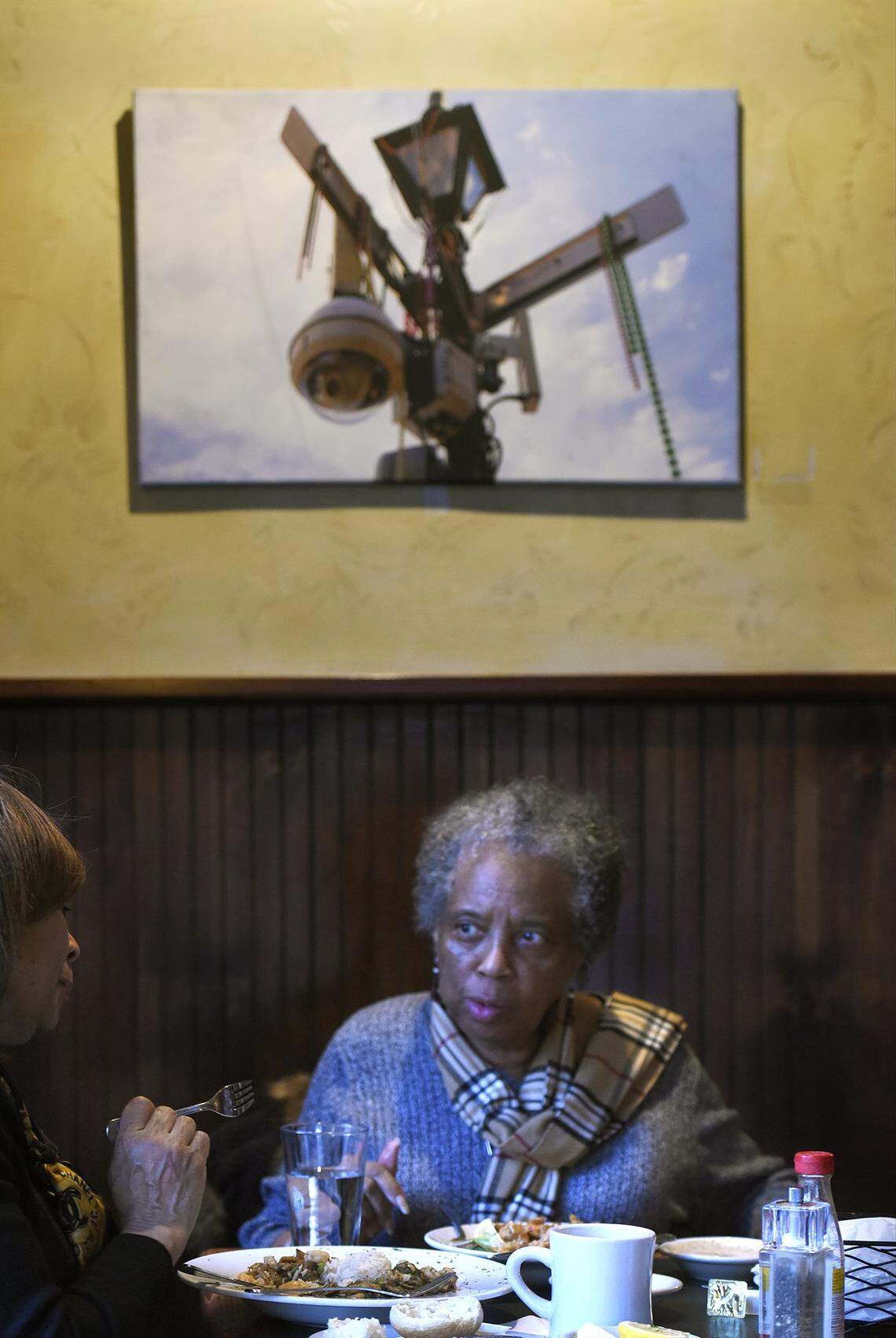Sisters, Temerrian Straite-Cuthbertson (left) and Anita Taylor, native Charlotteans, enjoy an evening of food and conversation at the Cajun Queen restaurant on Jan. 31, 2019.