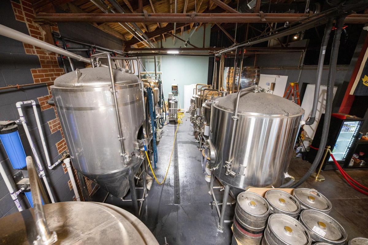 Brewery vessels line the front side of Petty Thieves Brewery.