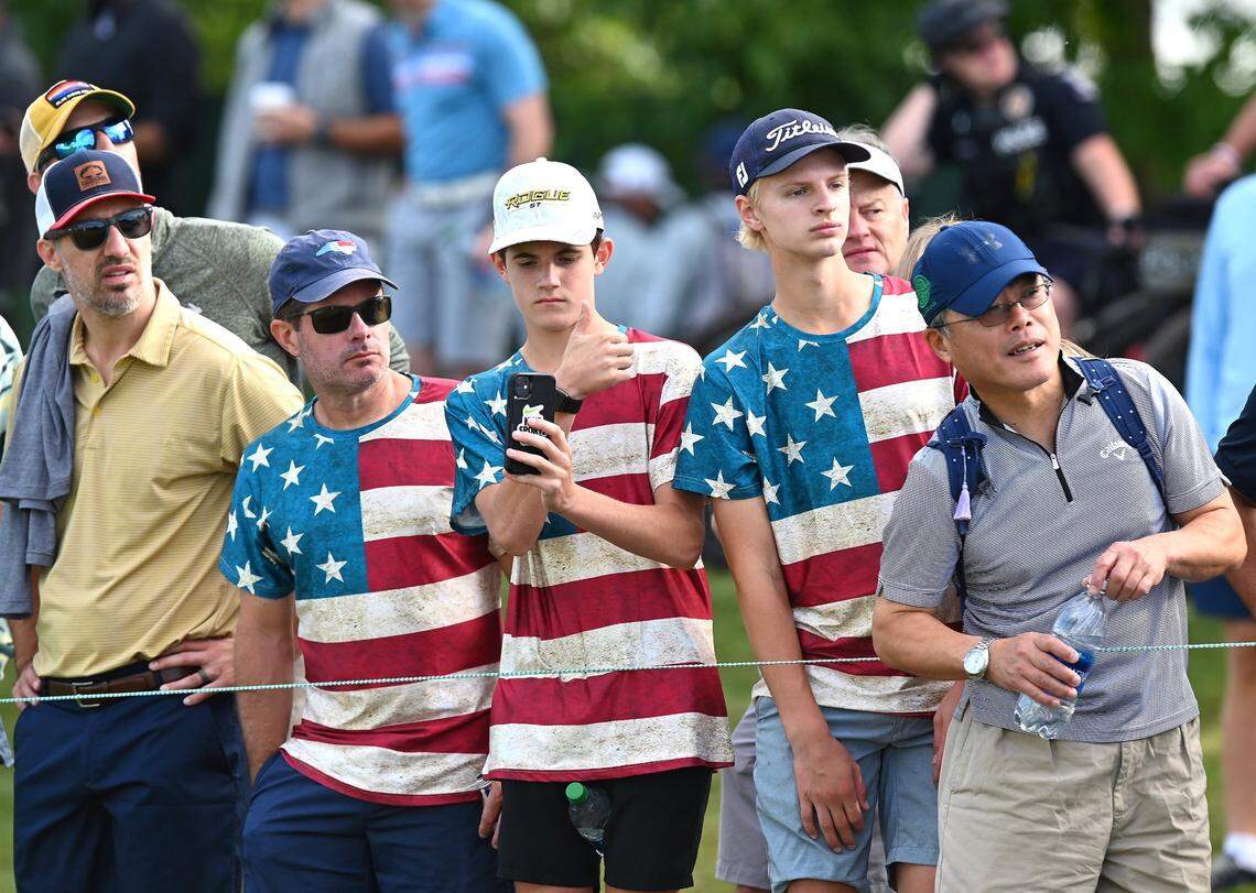 Fans watch members of the United States and International Teams tee off from the 11th tee box during third round action in the Presidents Cup at Quail Hollow Club in Charlotte, NC on Saturday, September 24, 2022.