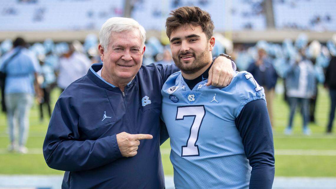 North Carolina coach Mack Brown salutes Sam Howell during Senior Day recognition prior to the Tar Heels’ game against Wofford on Saturday, November 20, 2021 at Kenan Stadium in Chapel Hill, N.C.