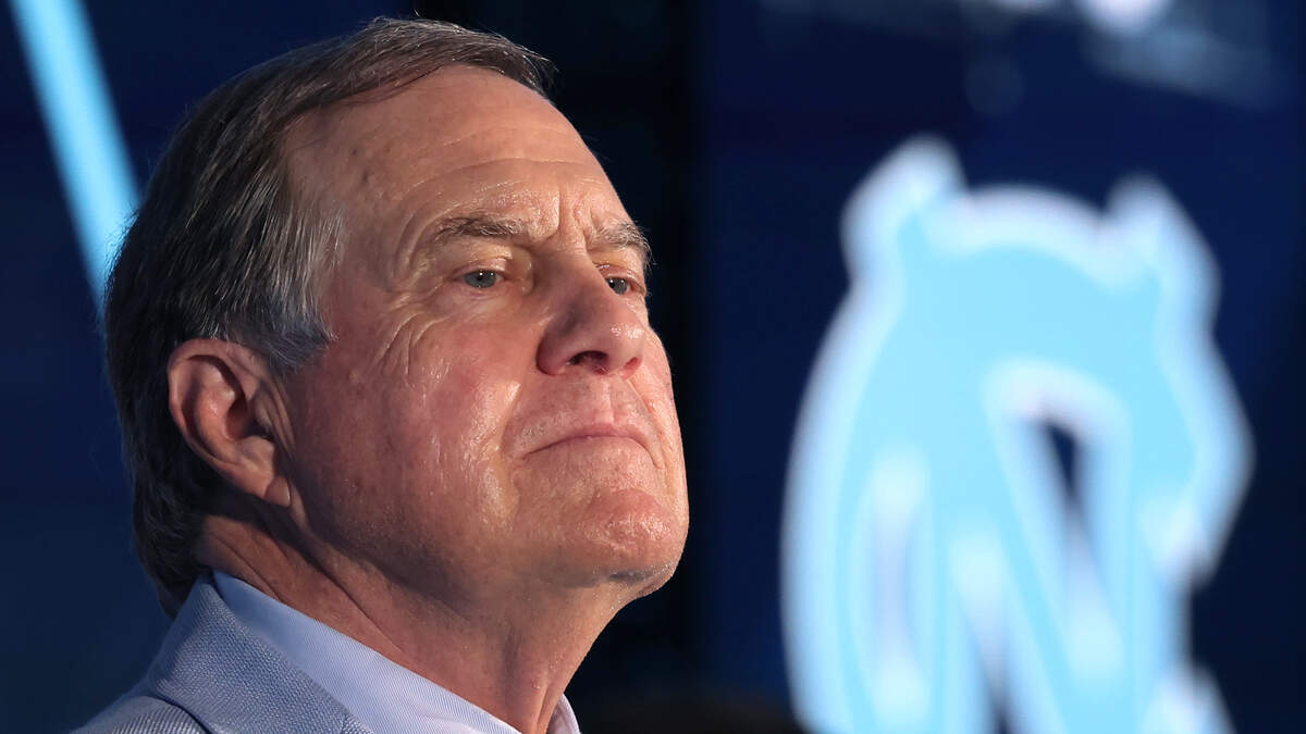North Carolina head football coach Bill Belichick listens to a reporter’s question during the 2026 ACC Football Kickoff program at the Charlotte Hilton Uptown hotel in Charlotte on Friday.