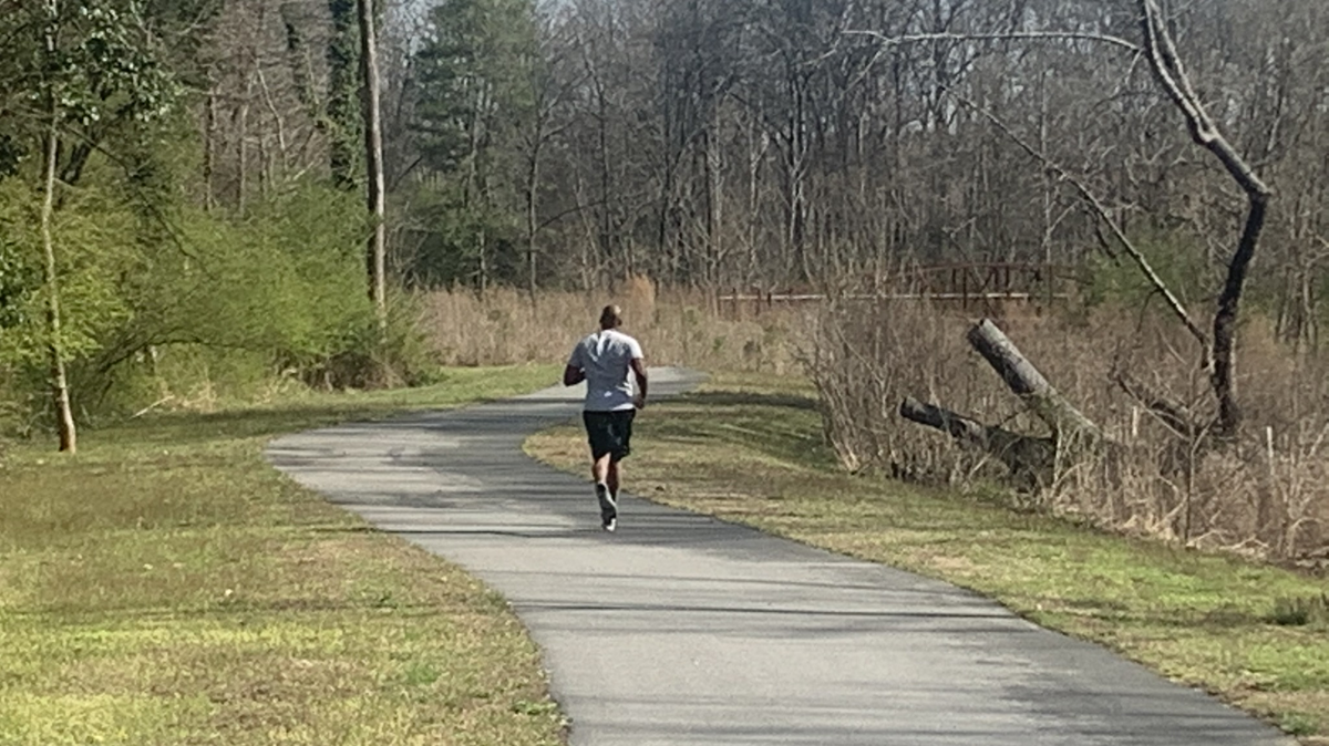 Darius McElvay enjoys a run along Toby Creek Greenway