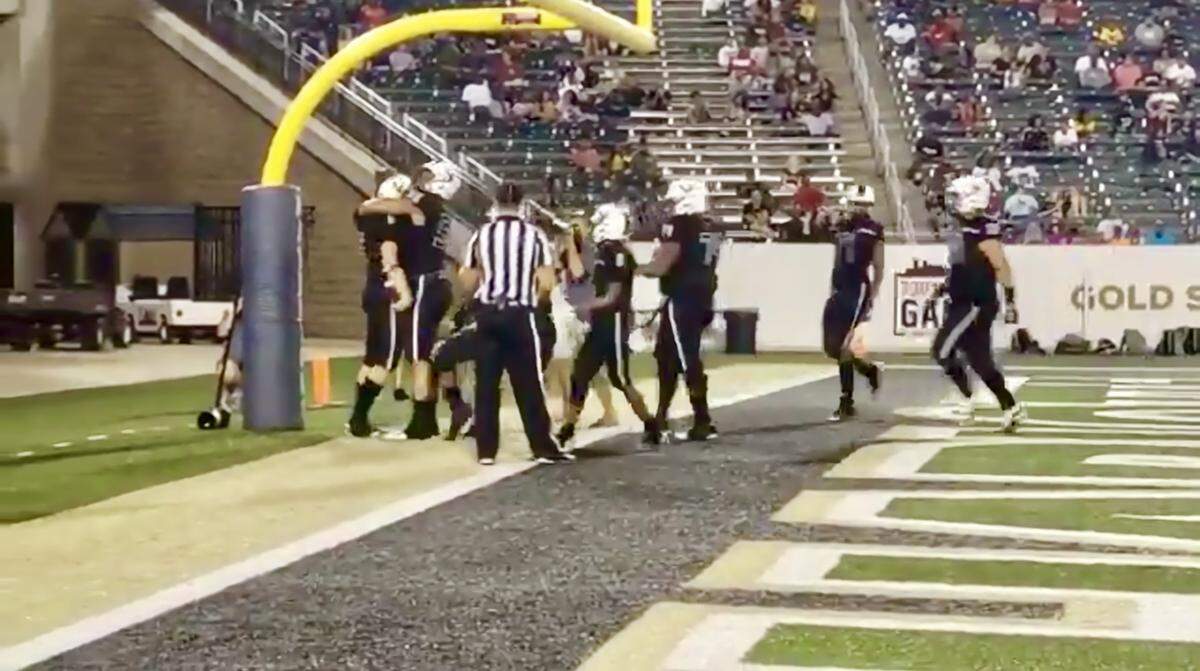 Mallard Creek celebrates a fourth quarter touchdown scored by senior quarterback Casey Kelly in a win over Vance.