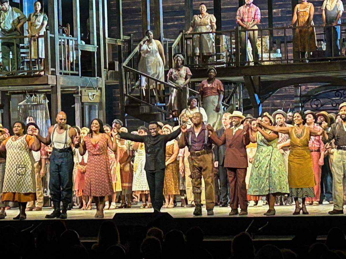 Conductor Kwamé Ryan and the cast of “Porgy and Bess” take their final bows Jan. 24, 2026, at the Met Opera in New York City. For opera star Denyce Graves, second from right in front row, this was her final performance in a decades-long career.