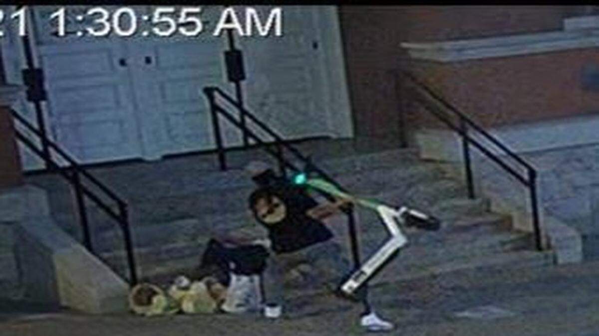 Police in Nashville, Tennessee, are looking for a man they say used a scooter to attack a person sleeping outside a famed music hall.