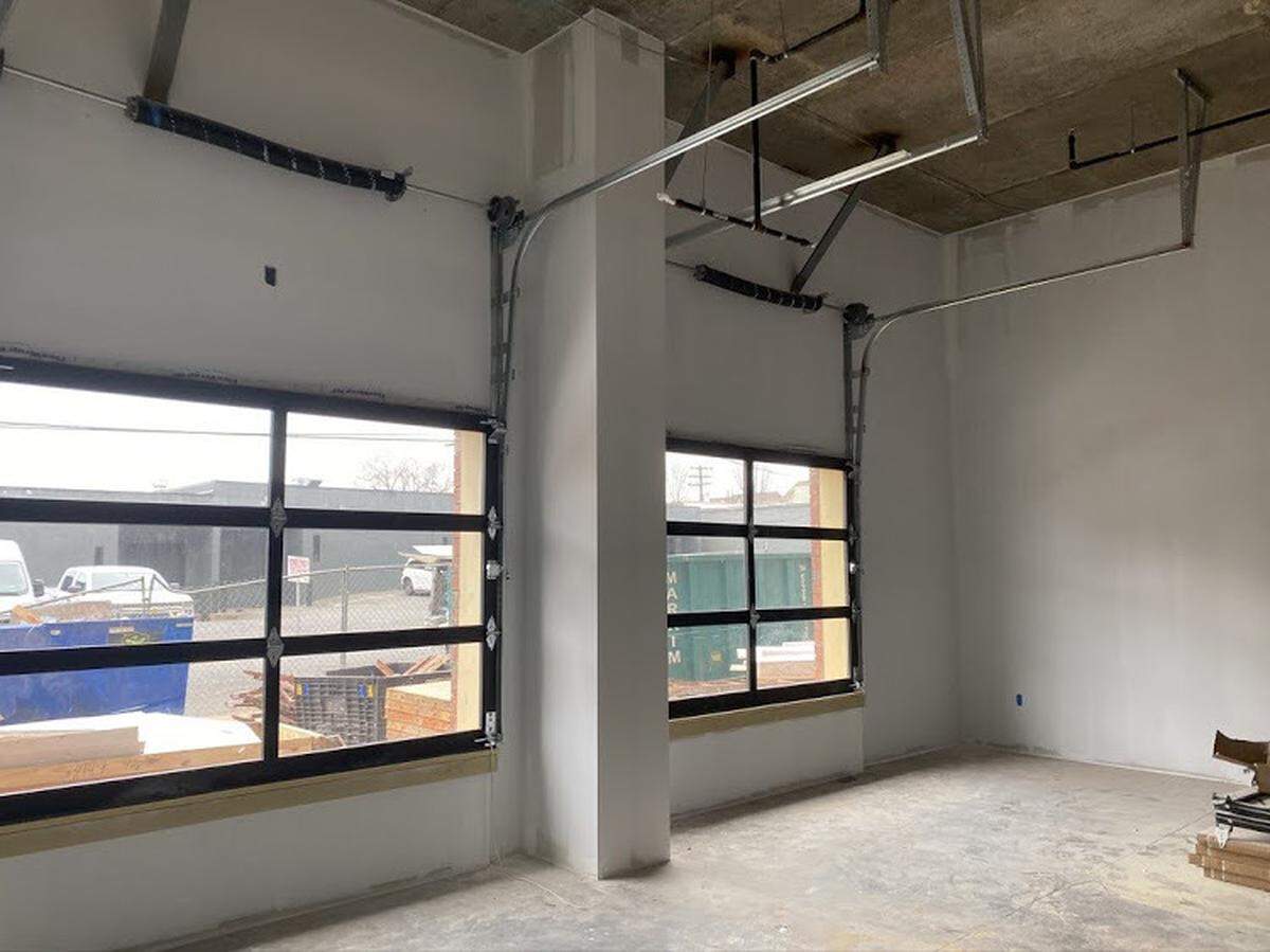 The space is currently under construction, but will feature garage doors that owner Britt Gooding hopes will create the perfect shopping ambiance.