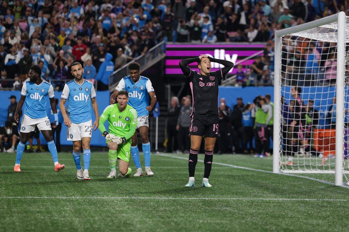 Inter Miami forward Robbie Robinson, far right, puts his hands on his head in disbelief at the miss during the match against Charlotte FC at Bank of America Stadium on Saturday, October 21, 2023 in Charlotte, NC. Charlotte FC held onto their lead to defeat Inter Miami, 1-0, clinching a spot in the playoffs.