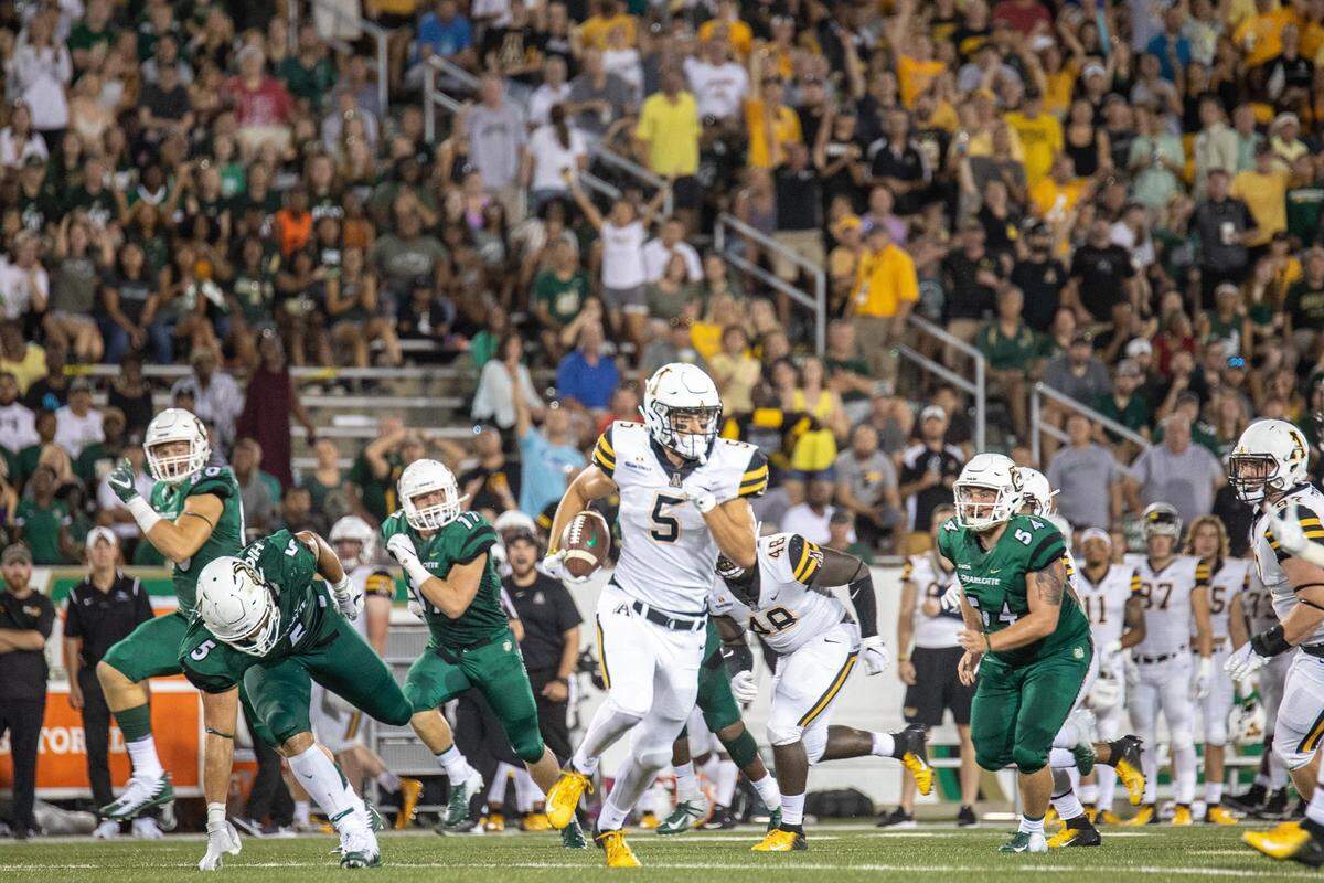 With UConn reportedly moving back to the Big East, it would be surprising if Charlotte and Appalachian State, shown above during their game in 2018, aren’t interested in joining the American Athletic Conference.