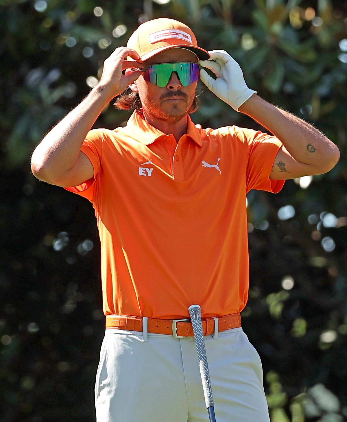 Rickie Fowler adjusts his sunglasses prior to teeing off from the 16th tee box during the final round of the Truist Championship at Quail Hollow Club in Charlotte, NC on Sunday, May 10, 2026. Fowler finished tied for second place at -13 for the championship.