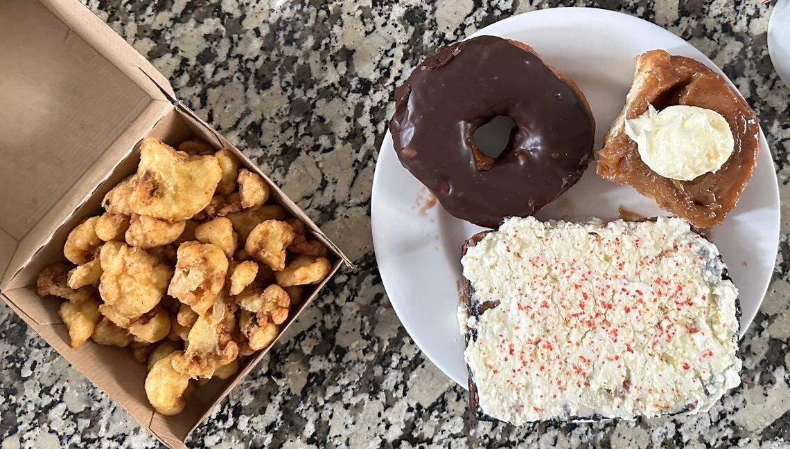 Milkbread’s crispy cauliflower, milk chocolate doughnut, cinny roll and milk and honey toast.