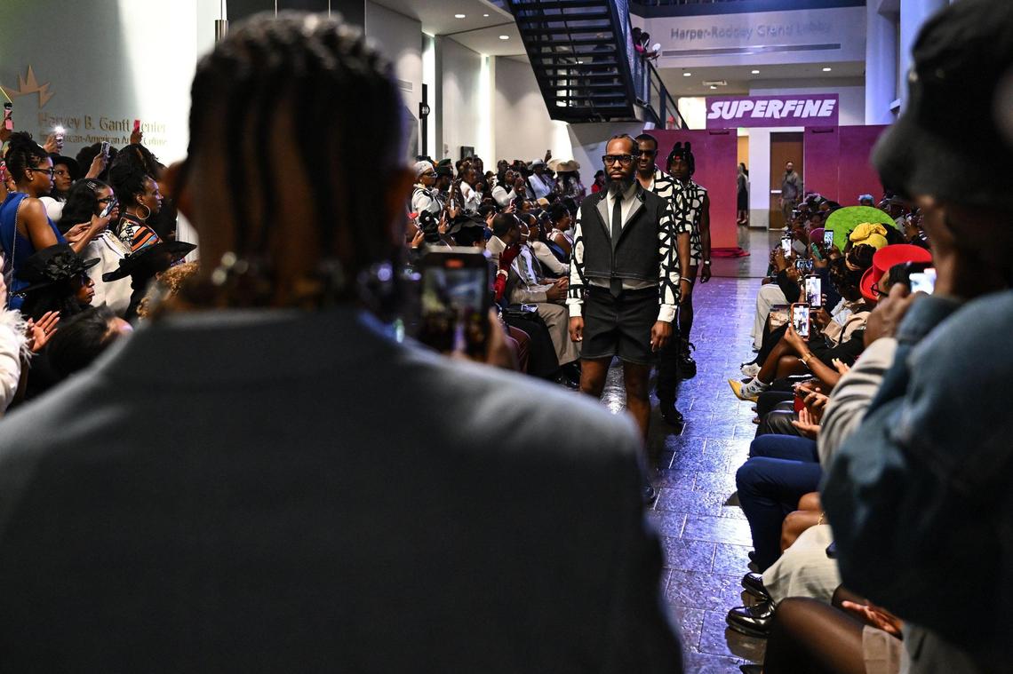 Models walk the runway duing “Superfine at the Gantt: Exploring Black Dandyism” at The Harvey B. Gantt Center, Friday, May 2, 2025, in Charlotte, N.C.