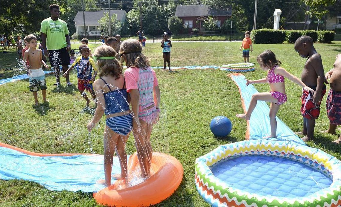 In this 2016 Charlotte Observer file photo, children enjoy slipping and sliding at the Johnston YMCA.
