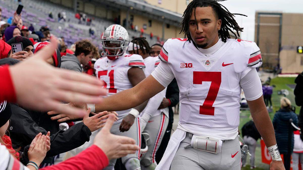 Ohio State quarterback C.J. Stroud (7) celebrates with fans after Ohio State defeated Northwestern 21-7 in an NCAA college football game, Saturday, Nov. 5, 2022, in Evanston, Ill. (AP Photo/Nam Y. Huh)