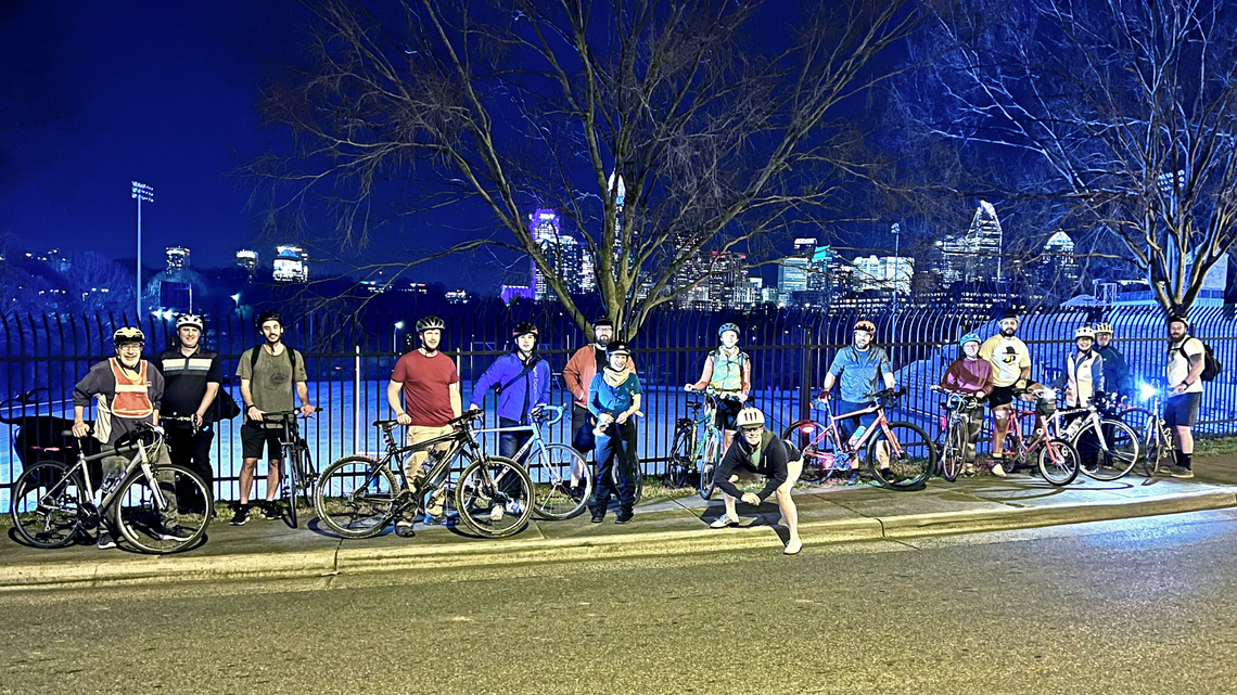 Cyclists gather recently for the Plaza Midwood Tuesday Night Ride. Mixing bikes and cars in the same lane often makes bicycling in Charlotte dangerous.