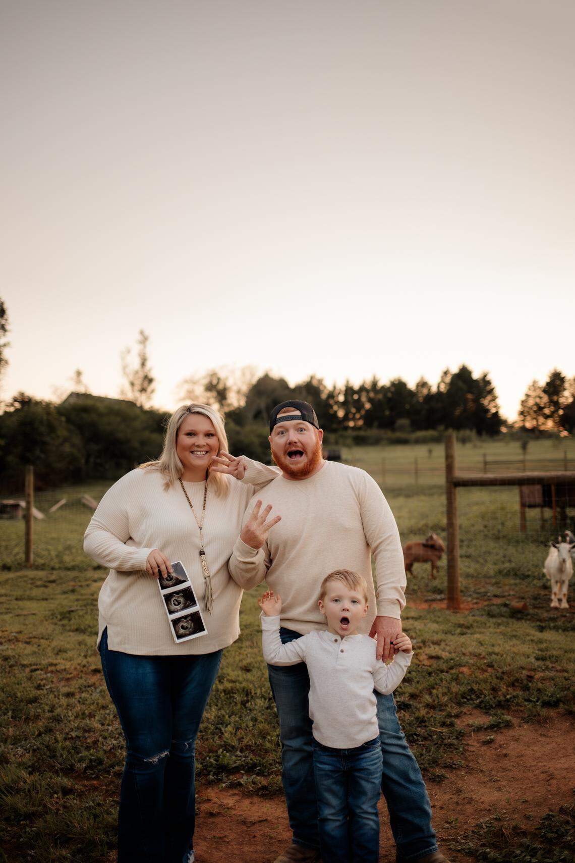 Hannah, Josh and Ryder Mosteller pose for their baby announcement photo.