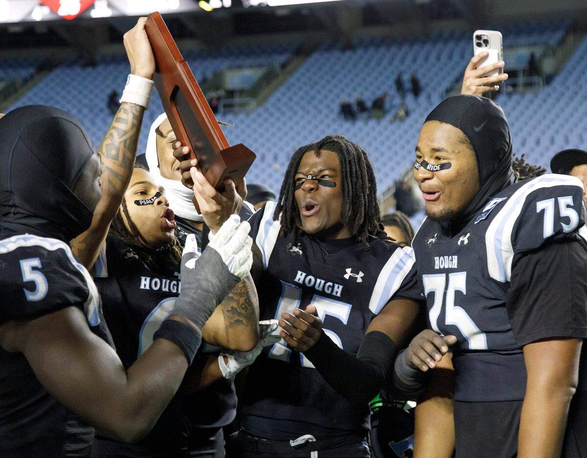 Hough celebrates following the Huskies’ 21-0 win over Millbrook in the NCHSAA 8A high school football state final on Thursday, Dec. 11, 2025, at Kenan Stadium in Chapel Hill, N.C. 