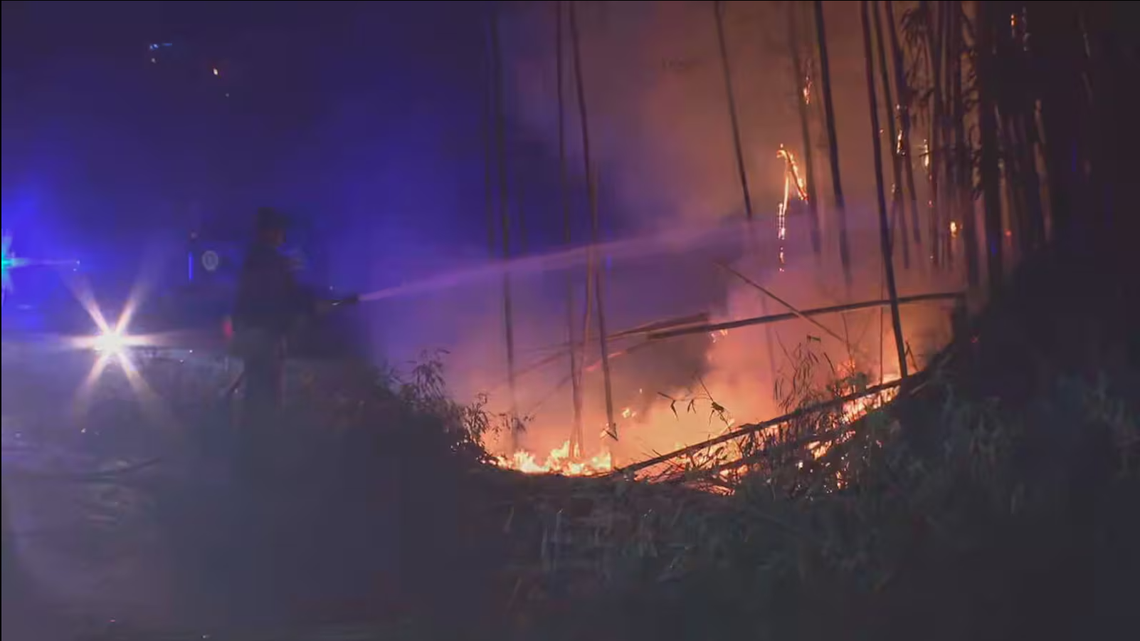 Firefighters in Western North Carolina contained 100% of a wildfire Thursday afternoon that previously forced people to evacuate from their homes in McDowell County.