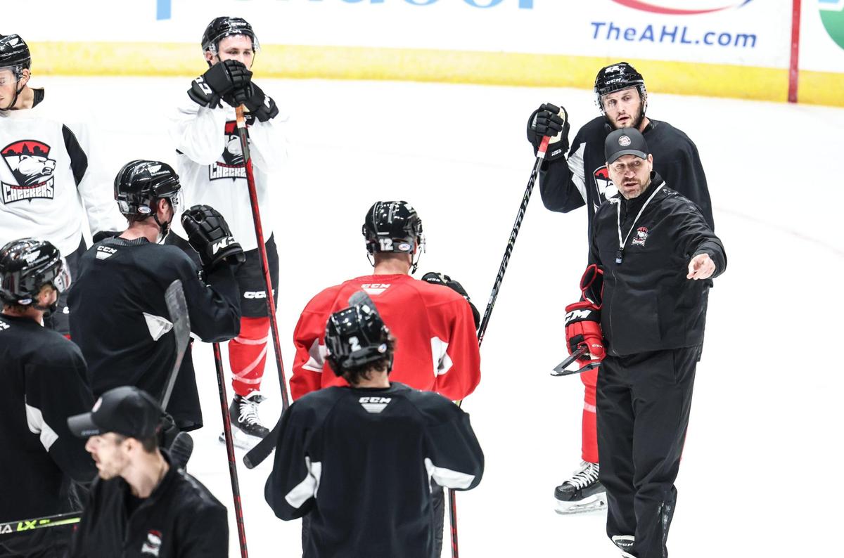 Checkers coach Geordie Kinnear talks to players during Charlotte Checkers practice in Charlotte N.C., on Wednesday, October 12, 2022.