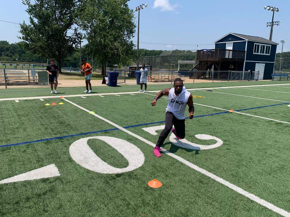 Former Indianapolis Colts and Buffalo Bills running back Nyheim Hines, a Garner, North Carolina, native, runs a cone drill at Weddington Optmist Park in Weddington, North Carolina on Wednesday, July 9, 2025. Hines, who started as an offensive playmaker at NC State, is working toward an NFL comeback.