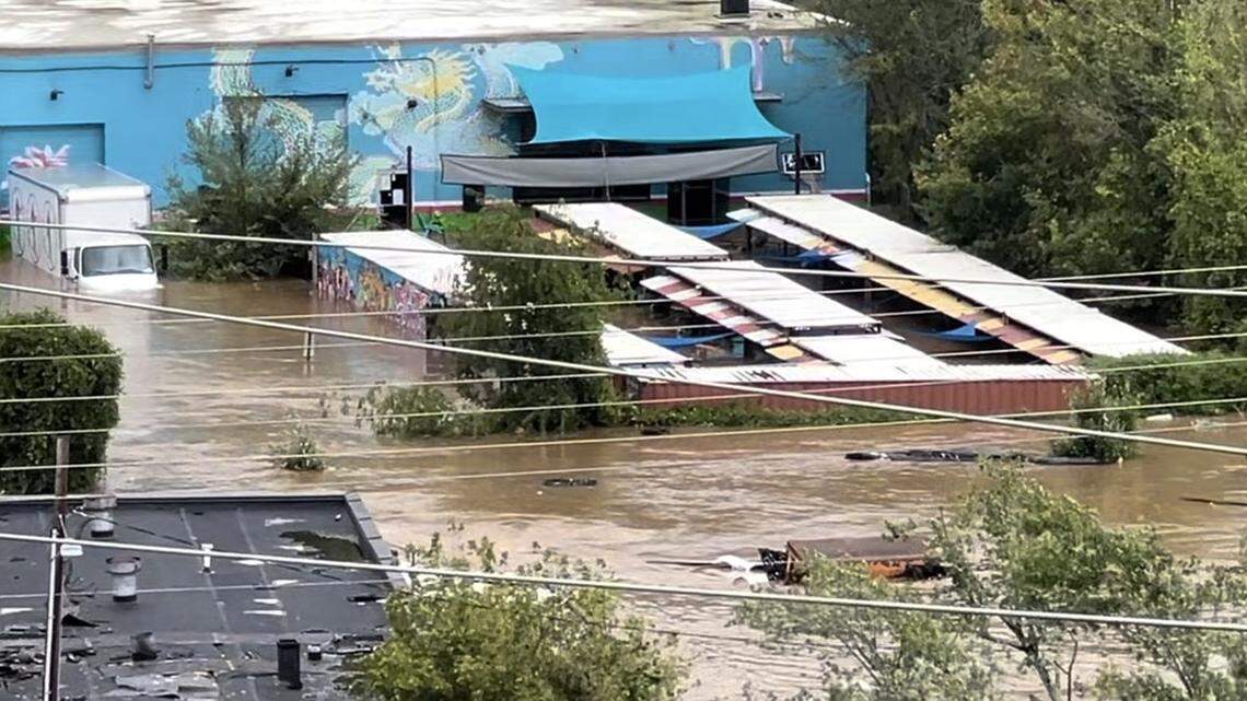 High waters during the flooding at Hi-Wire Brewing’s location in the River Arts District.