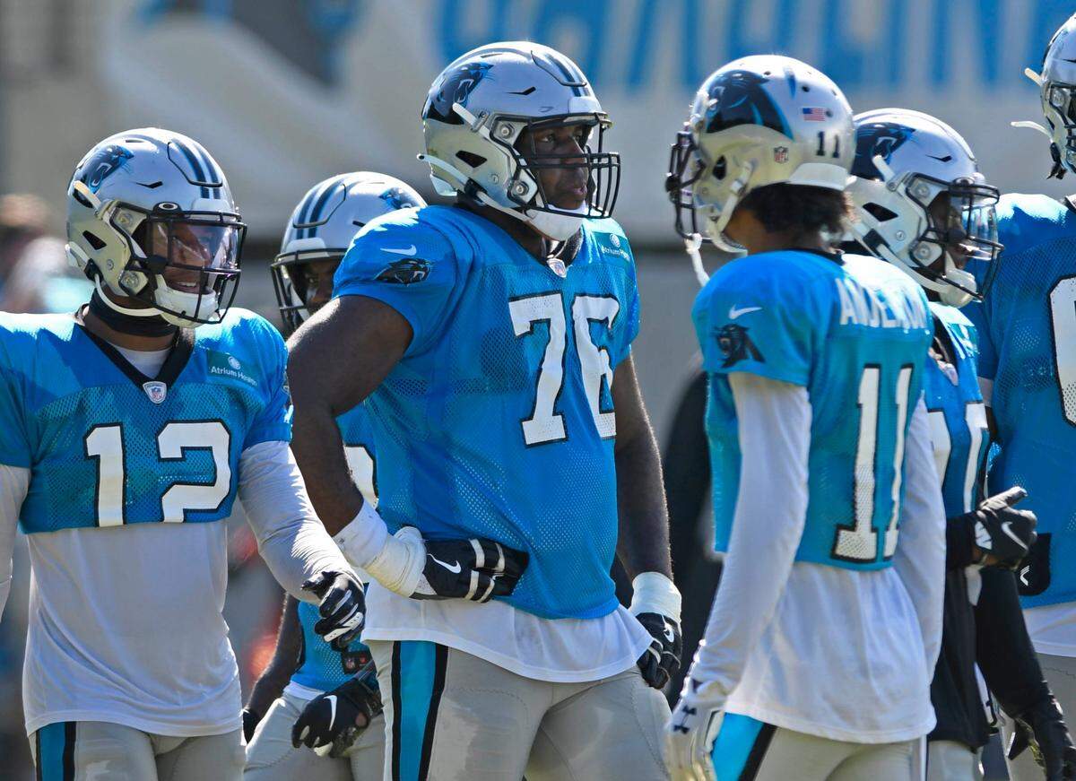 Carolina Panthers offensive tackle Russell Okung (76) prepares to huddle up during Carolina Panthers training camp on Tuesday, August 18, 2020.