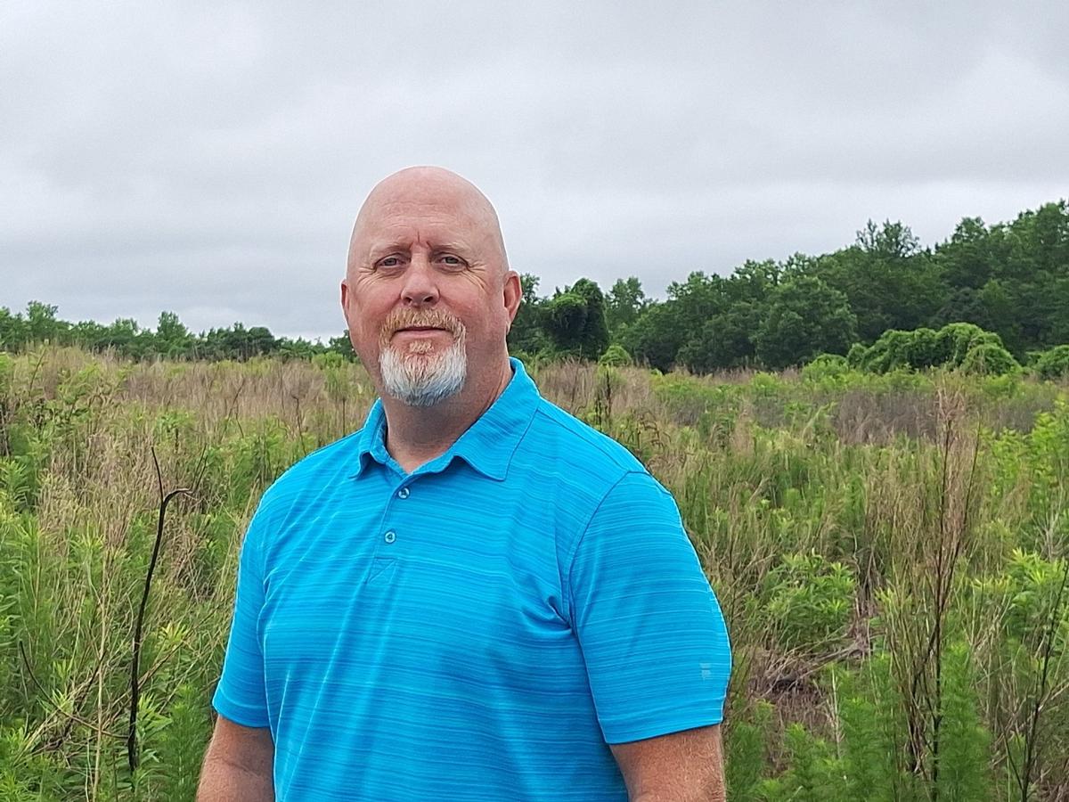 Wes Hunter is the ninth generation of his family to farm their Cornelius land. Hunter has had the land under contract for four years to a developer to put a business park on the acreage. Weeds filled the land on Wednesday, May 28, 2025, as they seek rezoning approval from the town of Cornelius.