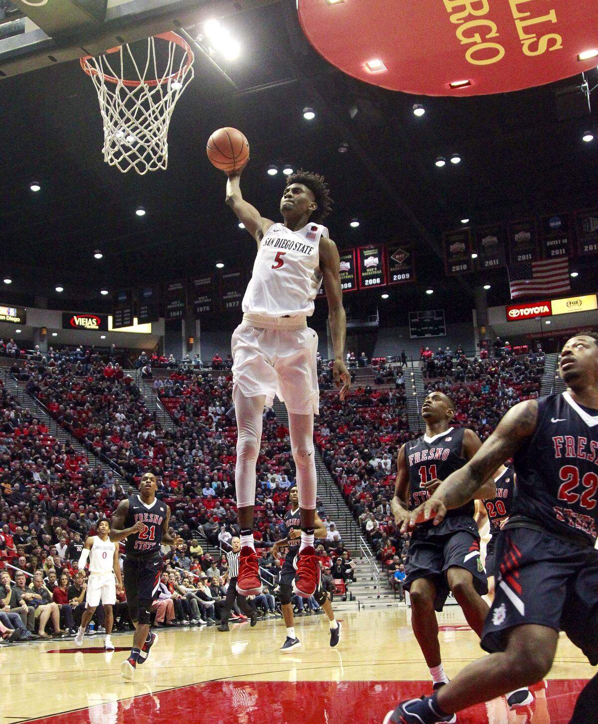 Jalen McDaniels, now a second-round draft pick of the Charlotte Hornets, goes up for a dunk while playing for San Diego State in 2018.
