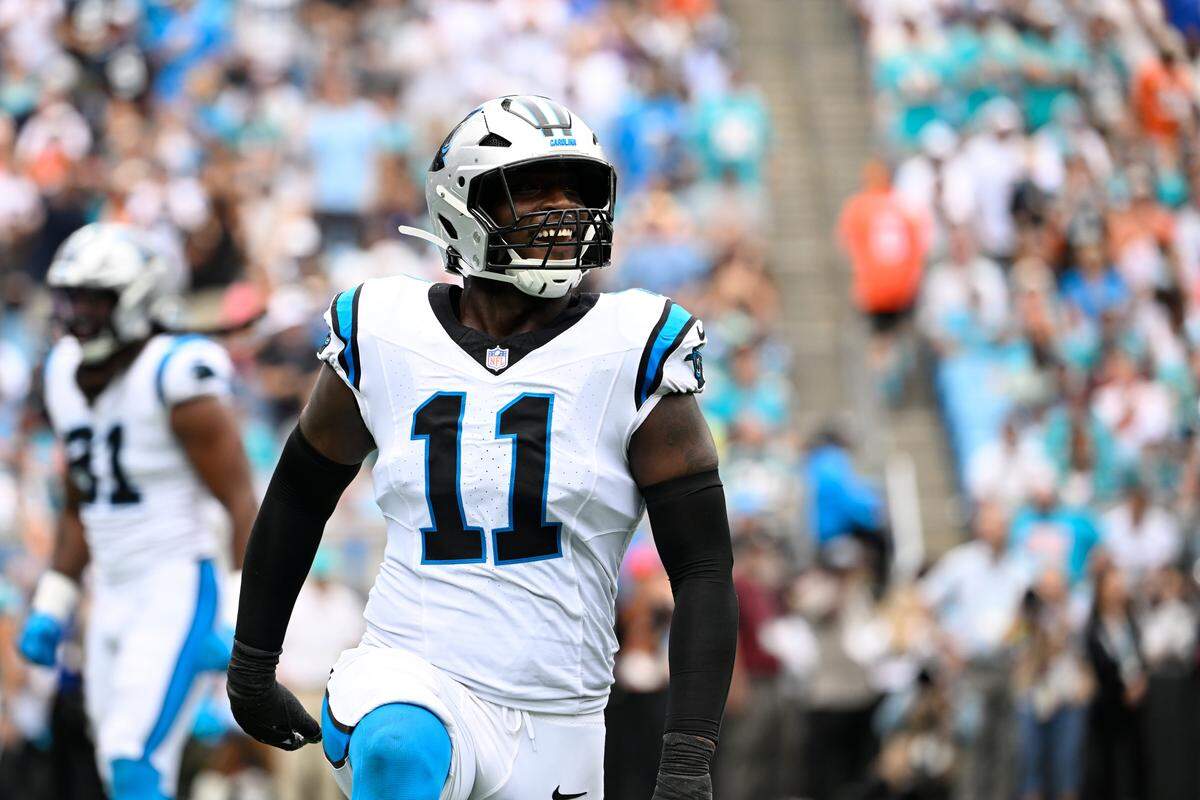 Oct 5, 2025; Charlotte, North Carolina, USA; Carolina Panthers linebacker Nic Scourton (11) reacts in the second quarter at Bank of America Stadium. Mandatory Credit: Bob Donnan-Imagn Images
