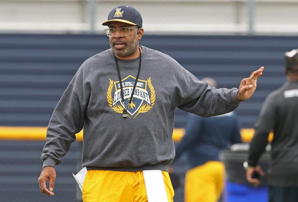 Johnson C. Smith University head football coach Maurice Flowers gives instructions to his team during practice on Wednesday, August 6, 2025.