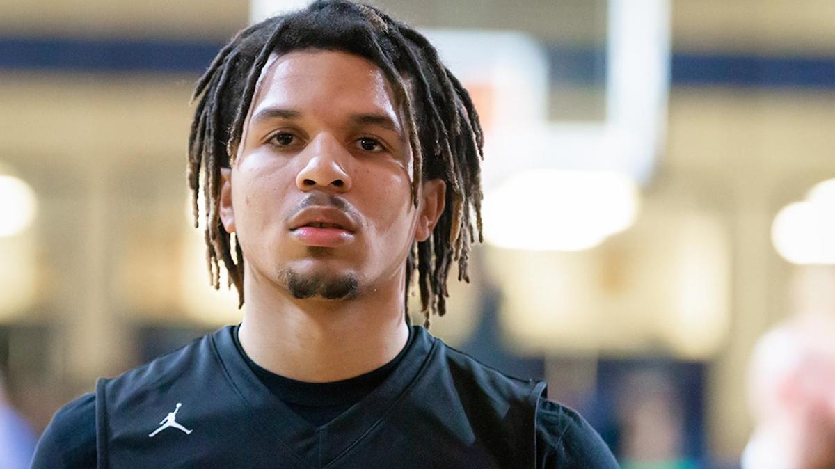 Oak Hill’s Cole Anthony runs through pre-game warmups.