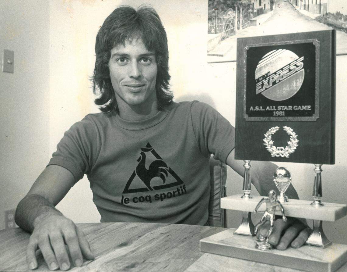 Carolina Lightnin’ star Tony Suarez shows off his MVP trophy for the 1981 American Soccer League all-star game.