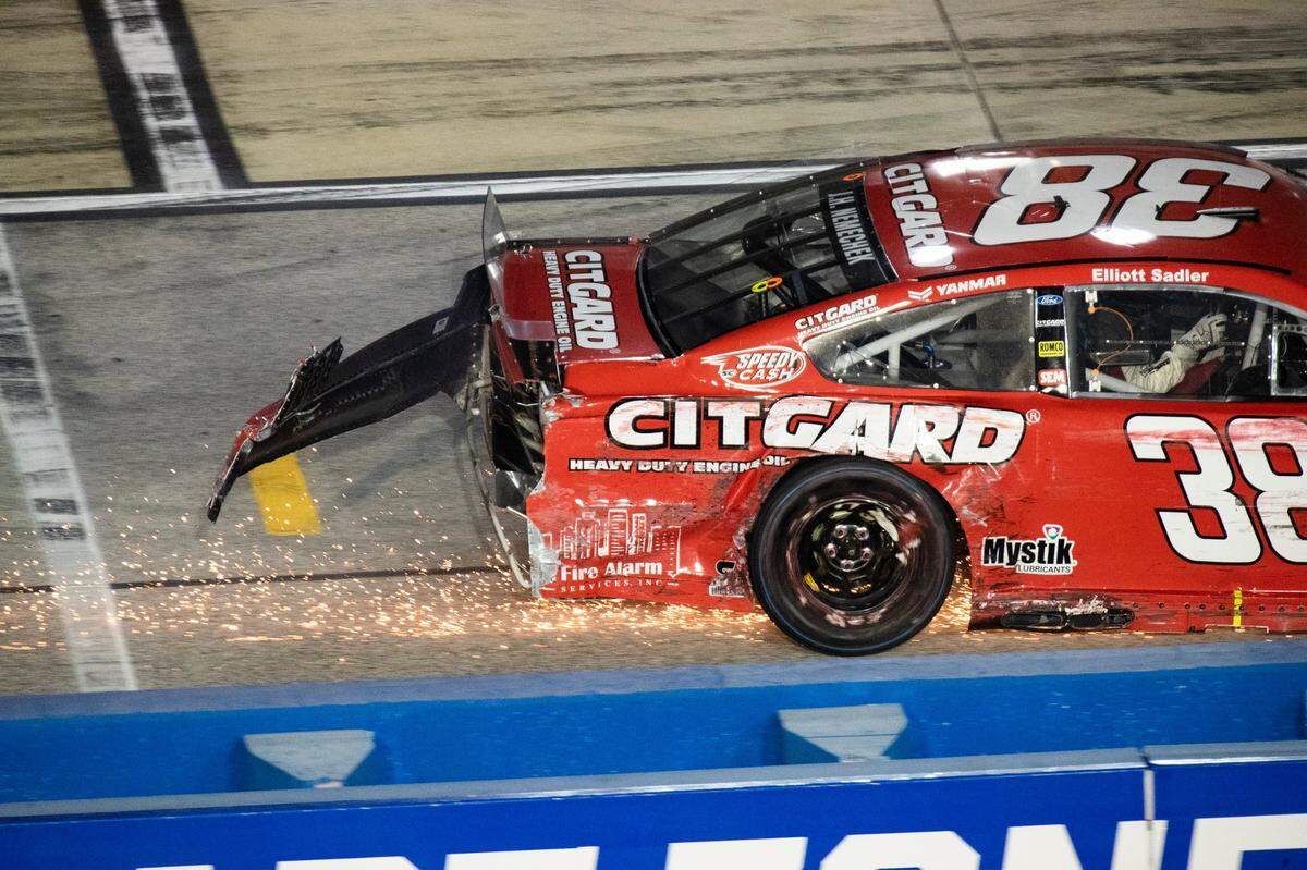Sparks fly from the car of John Hunter Nemechek after contact at The Cook Out Southern 500 at Darlington Raceway on Sunday, September 6, 2020.