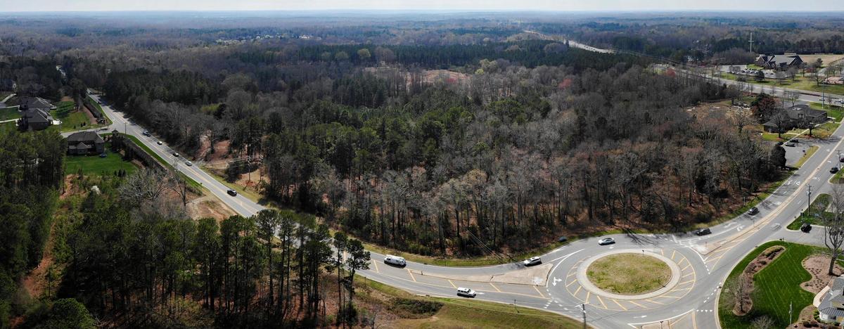 A composite image shows the location of a proposed 80-acre development that would bring new homes, retail spaces, restaurants and a park near the intersection of Providence and Weddington roads in Weddington. Some residents in the town of about 13,000 say the project would bring added traffic and more students to overcrowded schools. A public hearing is set for Monday night.