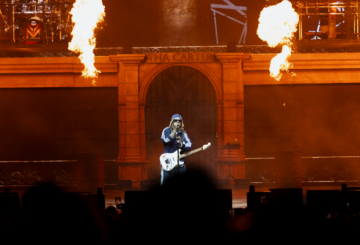Lil Wayne performs at the PNC Music Pavilion in Charlotte on Thursday night.