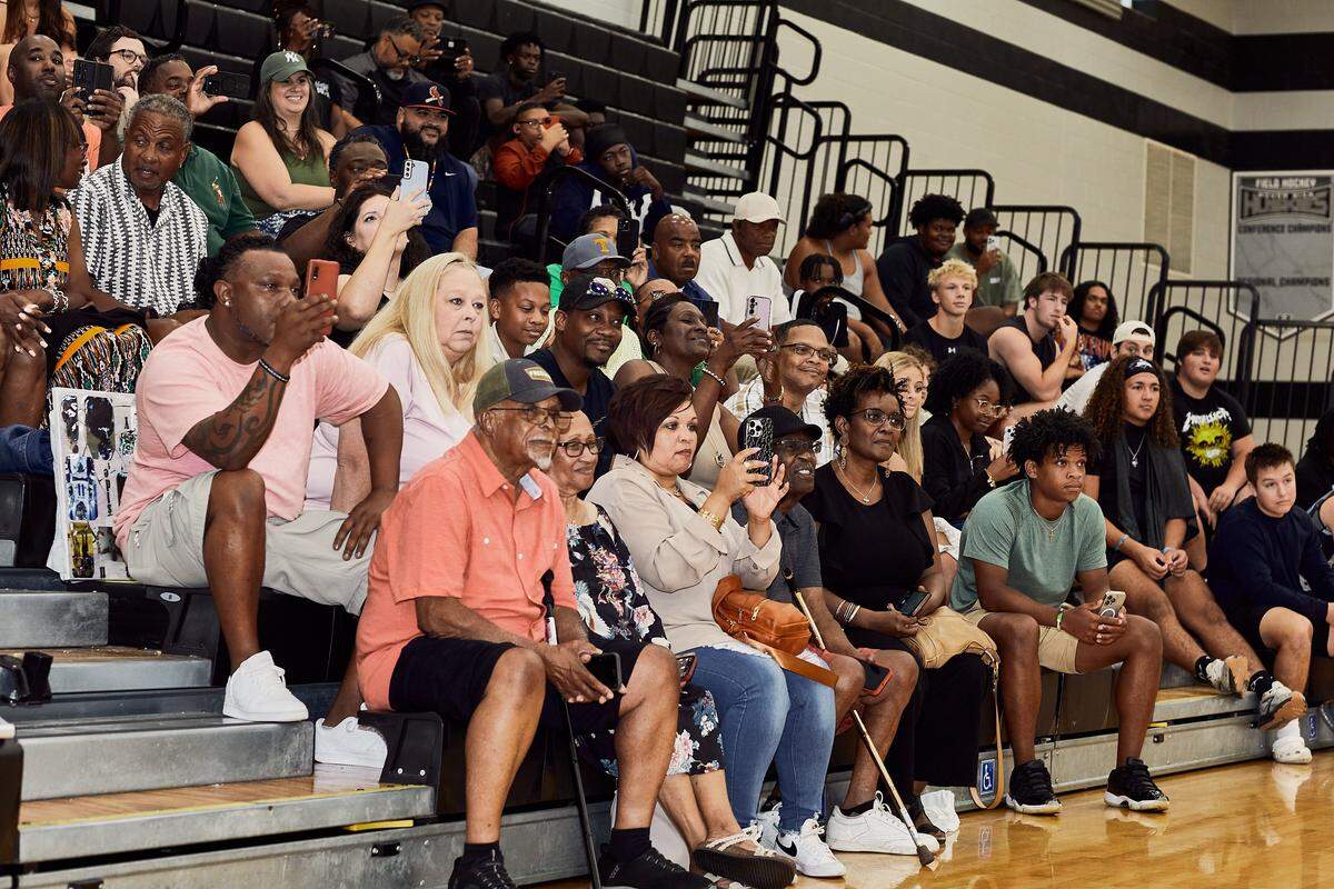 Family and Friends look on as Hough High's LJ Porter, a top high school football recruit in North Carolina, announces his college decision to East Carolina at Hough High School in Cornelius, NC.