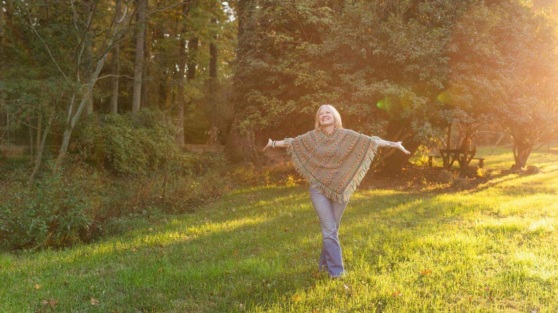 Tarot reader Jessica Mangum basks in the sunshine.
