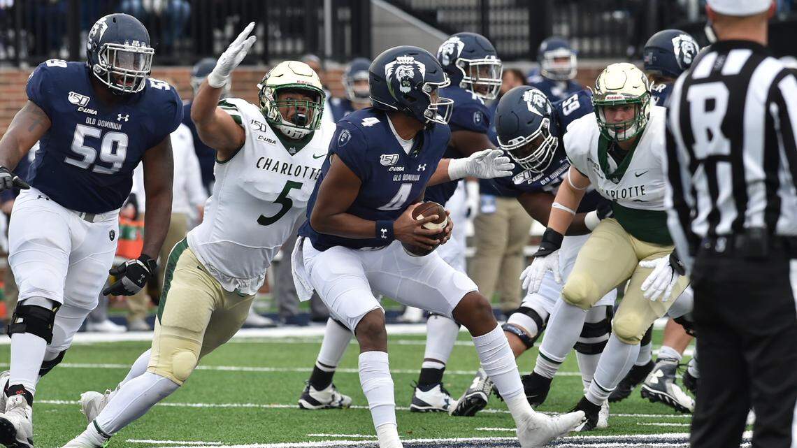 Charlotte 49ers defensive end Alex Highsmith sacks Old Dominion quarterback Stone Smartt on Saturday. SAM ROBERTS