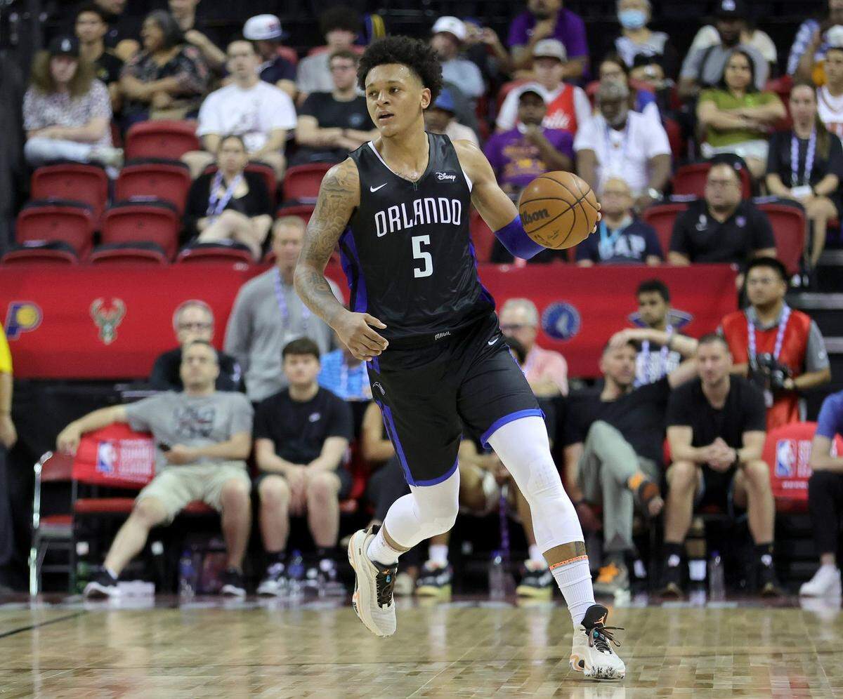 The Orlando Magic’s Paolo Banchero (5) brings the ball up the court against the Sacramento Kings during the NBA Summer League at the Thomas & Mack Center on Saturday, July 9, 2022, in Las Vegas. (Ethan Miller/Getty Images/TNS)
