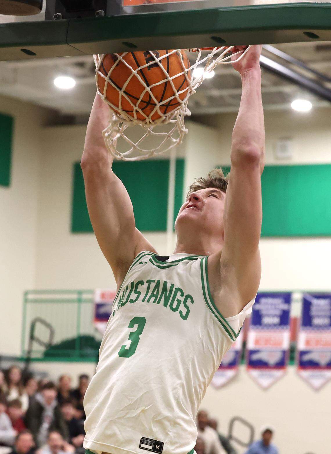 Myers Park Mustangs standout Thomas Vickery throws down a two-handed dunk during action against the West Meck Hawks on Feb. 6, 2026, at Myers Park High School in Charlotte. West Meck defeated Myers Park 62-59.