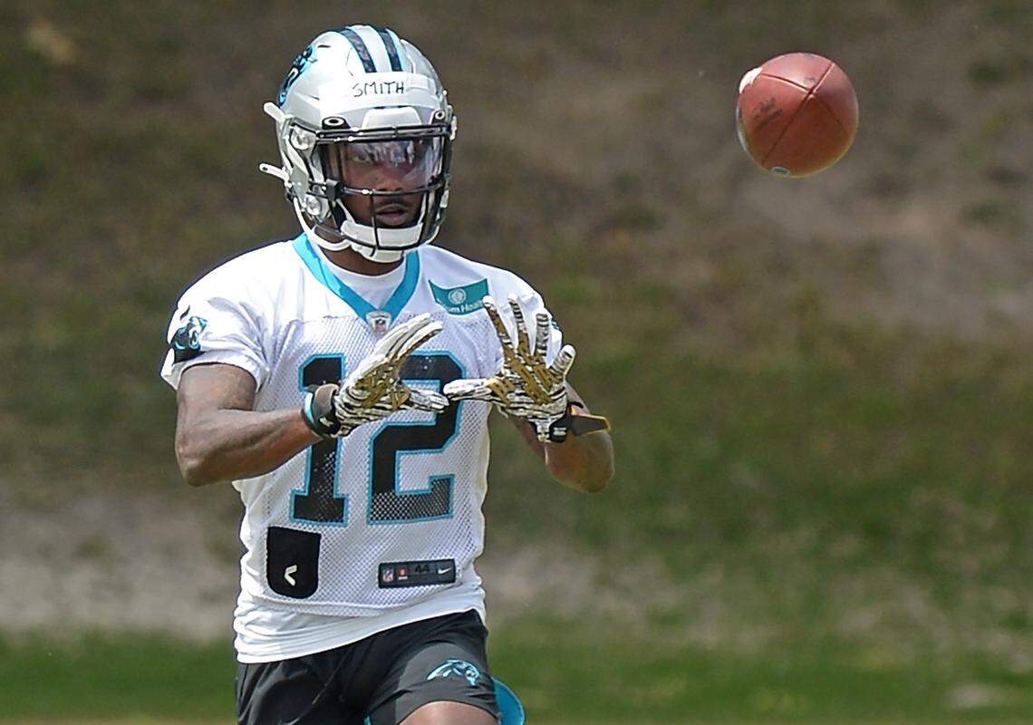 Carolina Panthers rookie wide receiver Shi Smith reaches out to catch a pass during the teamÕs 2021 rookie minicamp practice on Friday, May 14, 2021.
