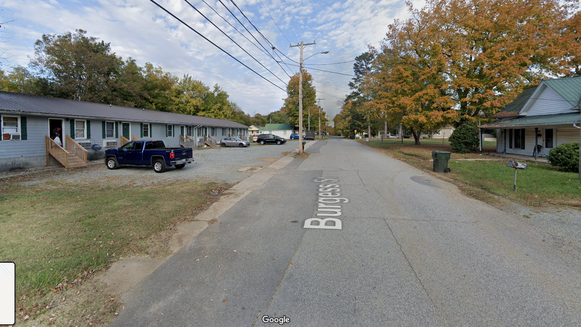 A gun found near a bloody trail led police into a burning apartment on Burgess Street in Lexington, North Carolina, where they discovered a critically hurt child and two dead adults, the Lexington Police Department said.